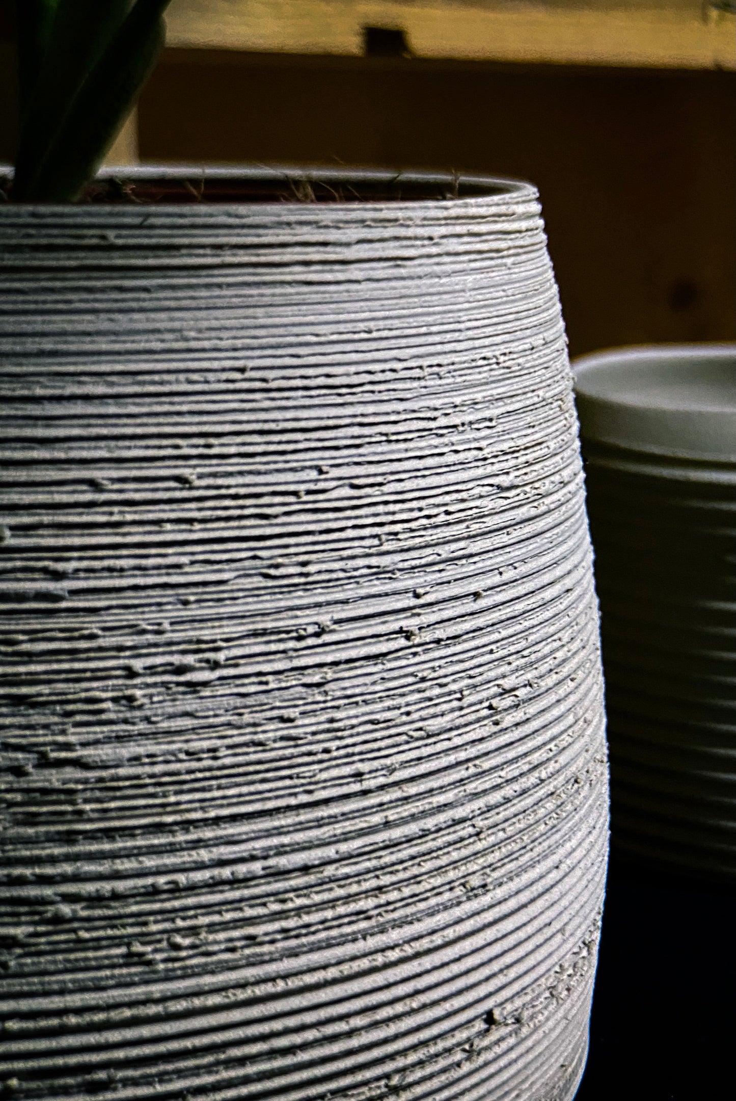 Plantpot holder - White clay with a rough and textured finish